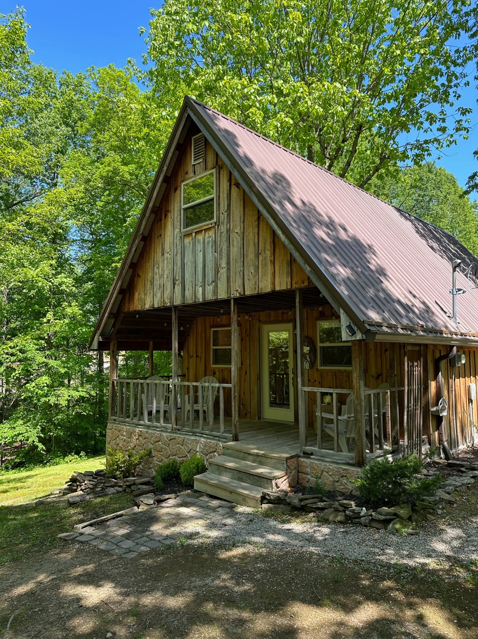 The Ridge A-Frame cabin exterior in summer