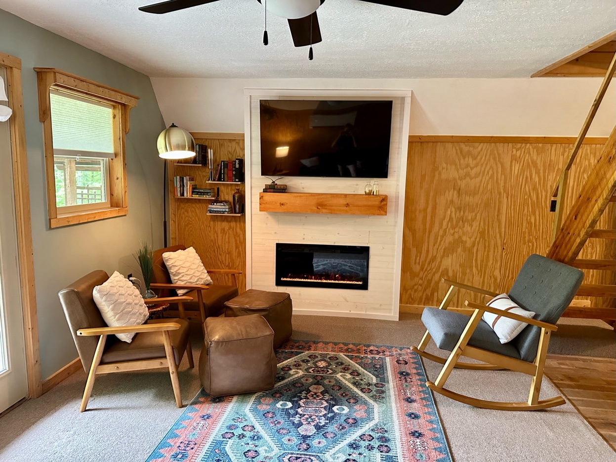 Living room with fireplace and Smart TV